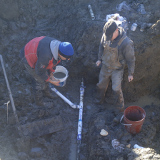 Cal and Fritz repairing a broken water line